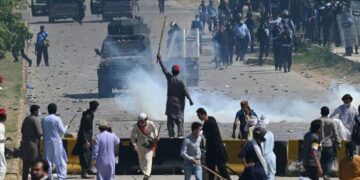 Srinagar Highway has turned into a battlefield as police and workers face off against each other