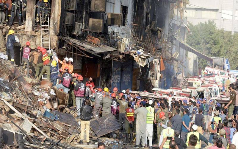 Gul Plaza Tragedy: Identities of 69 Victims Confirmed, Government Report Exposes Major Lapses — PakAlerts.net: Sansani Nahi, Srif Khabar — Your go-to digital hub for Breaking News, Analysis, Stories from Pakistan and around the World. Stay informed, Stay connected. Gul Plaza Tragedy: Identities of 69 Victims Confirmed, Government Report Exposes Major Lapses