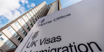 UK Introduces New Residency Fee for Asylum Seekers Who Begin Working