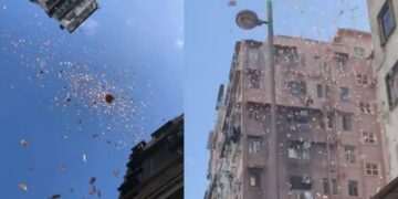 ہانگ کانگ کے ایک غریب علاقے میں ڈالرز کی بارش