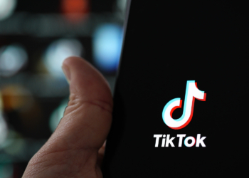 The TikTok logo is seen on an iPhone 11 Pro max in this photo illustration in Warsaw, Poland on September 29, 2020. The TikTok app will be banned from US app stores from Sunday unless president Donald Trump approves a last-minute deal between US tech firm Oracle and TikTok owner ByteDance. US authorities say the Chinese video sharing app threaten national security and could pass on user data to China. (Photo by Jaap Arriens / Sipa USA)No Use UK. No Use Germany.